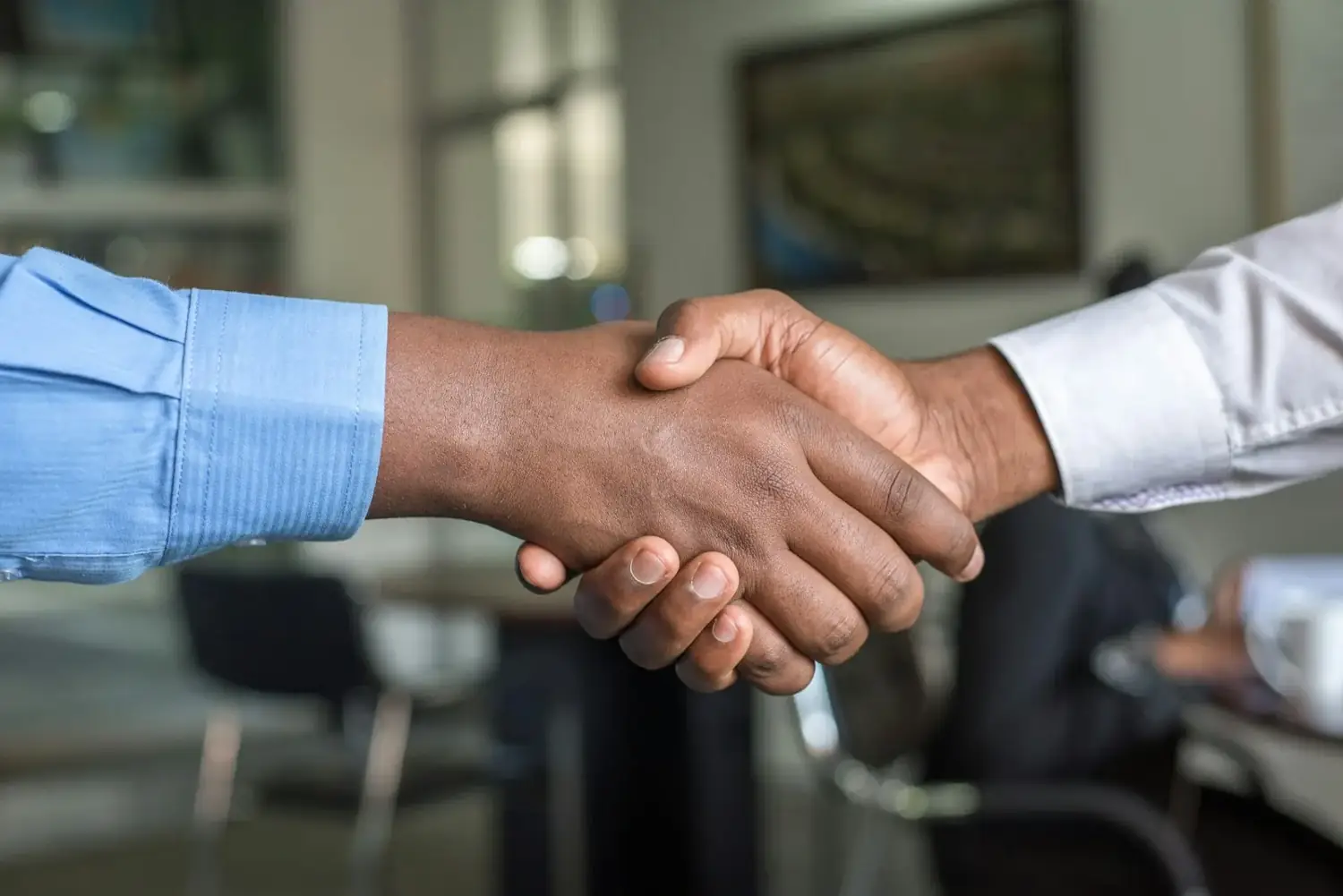 Buyer and developer shaking hands